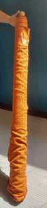 lot 49 image: Bolt of Orange Stripped Upholstery Fabric