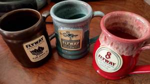 lot 51 image: 3 FlyAway Film Festival Pottery Mugs