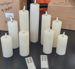 lot 108 image: 9 LED Eywamage Flickering Pillar Candles