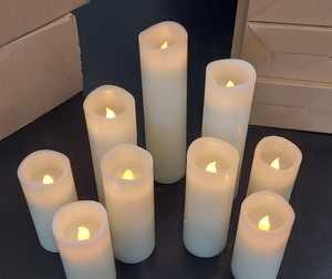 lot 61 image: 9 LED Flameless Paraffin Coated Candles