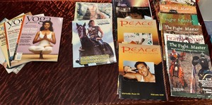 lot 80 image: The Fight Master , Xena, Highlander fan clubs and Yoga magazines