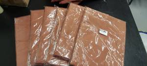 lot 120 image: 6 Terra Cotta Polyester Tables Clothes