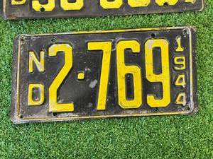 lot 48 image: 1944 ND License Plates