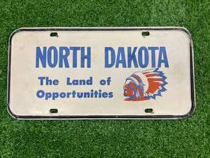 lot 53 image: ND The Land of Opportunities License Plate