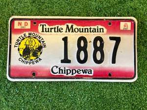 lot 99 image: Turtle Mountain Chippewa ND License Plate