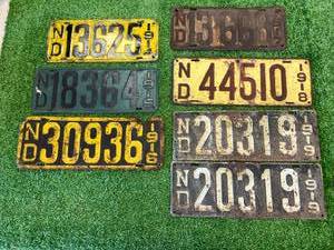 lot 102 image: 1914-1919 ND License Plates