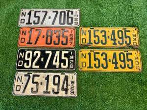 lot 105 image: ND 1926-1930 License Plates