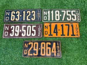lot 107 image: 1931-1935 ND License Plates