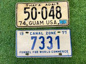 lot 140 image: Guam & Canal Zone License Plates