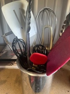 2 containers of kitchen utensils