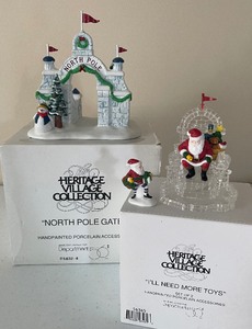 lot 59 image: Retired Dept. 56 North Pole Series North Pole Gate and Ill Need More Toys