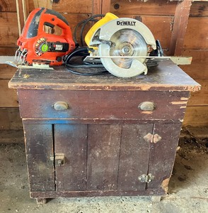 lot 20 image: Black & Decker Jigsaw, DeWalt Circular Saw, Wooden Cabinet