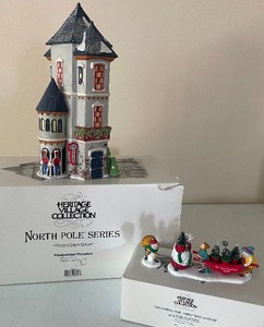 lot 46 image: Retired Dept. 56 North Pole Series Tin Solider Shop and Delivering the Christmas Greens Two Piece LOT No lights