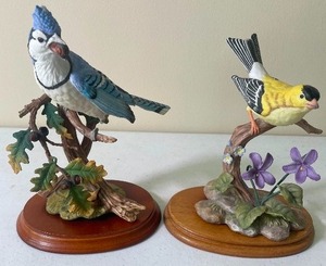 lot 80 image: Porcelain Songbird Serenade by Maruri USA Blue Jay with Oak and Goldfinch with Violets