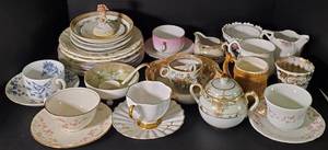 lot 103 image: Teacup and Saucer Lot