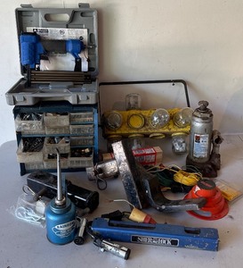 lot 138 image: Garage LOT Vintage Rainbow Pump Oiler, Small Parts Organizer, Bottle Jack, Brad Nailer