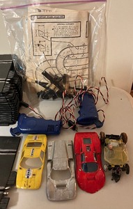 lot 134 image: Slot Cars and Race Tracks Two Controllers and Power Pack by Strombecker