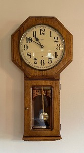 lot 101 image: Howard Miller Wall Clock with Pendulum