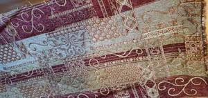 lot 214 image: Upholstery Fabric Gold and Red