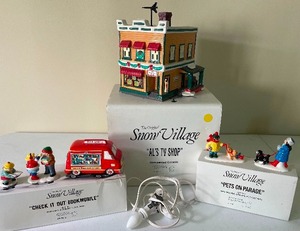 lot 228 image: Als TV Shop Dept. 56 The Original Snow Village with Check It Out Bookmobile and Pets on Parade