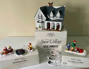 lot 229 image: Gothic Farmhouse Dept. 56 The Original Snow Village with Marshmallow Roast and Let it Snow Let it Snow