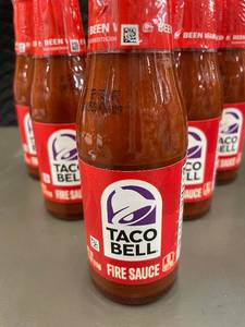 lot 428 image: HI 1 - Taco Bell Fire Sauce - Lot of 6 Bottles