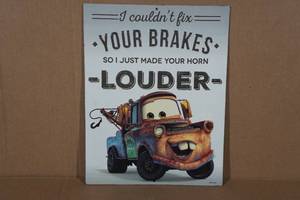 lot 89 image: Raised Tin Cars Movie Sign