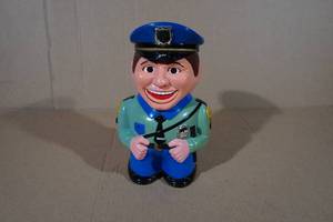 lot 92 image: Novelty Talking Plastic Cookie Police Jar