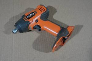 lot 125 image: Ridgid Impact Drill -Tool Only