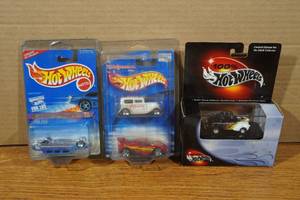 lot 157 image: 4 Hot Wheels Cars - Error Limo, Walgreens 2 Pack, 100% Willys