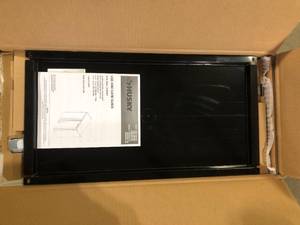 lot 19 image: Husky Ready-to-Assemble 24-Gauge Steel Wall Mounted Garage Cabinet in Black (28 in. W x 29.7 in. H x 12 in. D) Customer Returns See Pictures