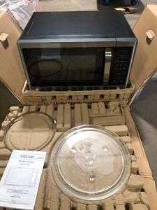 lot 29 image: Vissani 1.6 cu. ft. Countertop with Sensor Cook Microwave in Stainless Steel     Customer Returns See Pictures