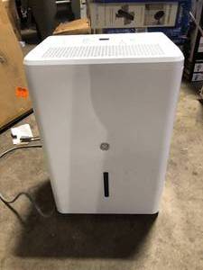 lot 49 image: GE 25-Pints for Damp Rooms Up to 1500 sq. ft. Residential Dehumidifier with Bucket in White   Customer Returns See Pictures