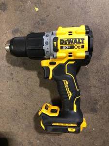 lot 33 image: DEWALT 20V Compact Cordless 12 in. Hammer Drill (Tool Only) Customer Returns See Pictures