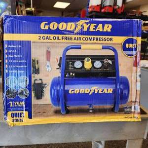 lot 3 image: New Goodyear TAW-0508S 125 psi 2 Gal Quiet Portable Roll Cage Design Air Compressor