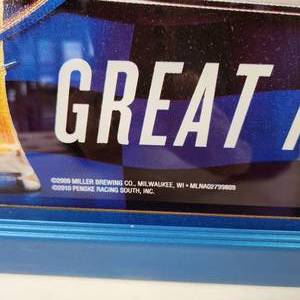 lot 17 image: Vintage Miller Lite Great Taste Great Finish Kurt Busch Motorsports Beer Sign Blue Frame