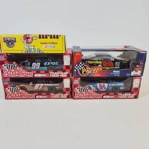 lot 85 image: 5 Nascar Cast Iron Race Cars