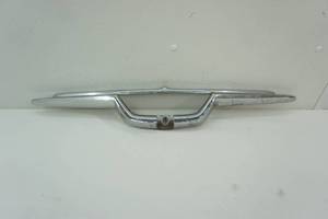 Original chrome emblem housing trim