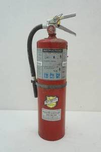 Filled, recharged fire extinguisher