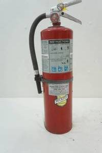 Filled, recharged fire extinguisher