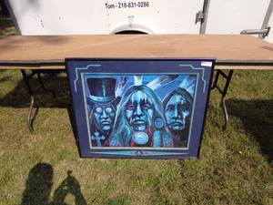 Framed Artwork of Three Abstract Faces