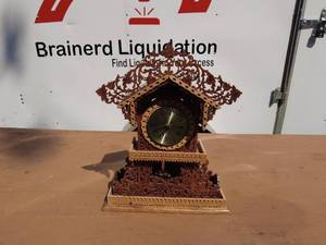 Intricately Carved Wooden Mantel Clock