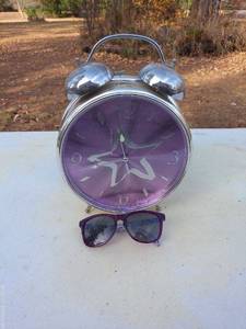 Vintage Purple Alarm Clock with Decorative Sunglasses