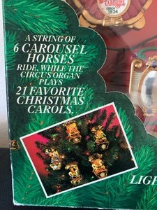lot 103 image: Vintage Mr. Christmas Holiday Carousel