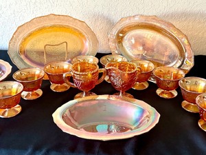 lot 33 image: Vintage Iridescent Peach Carnival Glass Serving Platters, Sorbet Cups and More