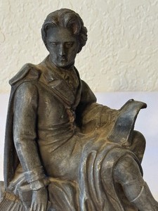 lot 35 image: Antique Cast Iron Clock Topper Figurine