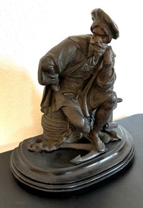 lot 25 image: A French Bronze Model of a Seated Explorer, Possibly Ferdinand Magellan or Christopher