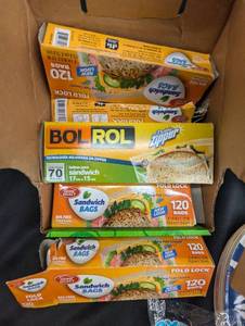 lot 21 image: Large Lot of Household Essentials - Trash Bags, Paper Plates, Sandwich Bags, Toilet Paper