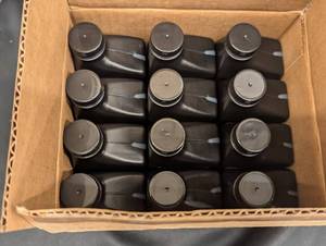 lot 31 image: back pallet - Box of 7-Eleven 2-Cycle Engine Oil - 12 Bottles (8 fl oz each)