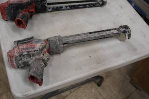 lot 383 image: Milwaukee 12V Caulk and Adhesive Gun 2441-20